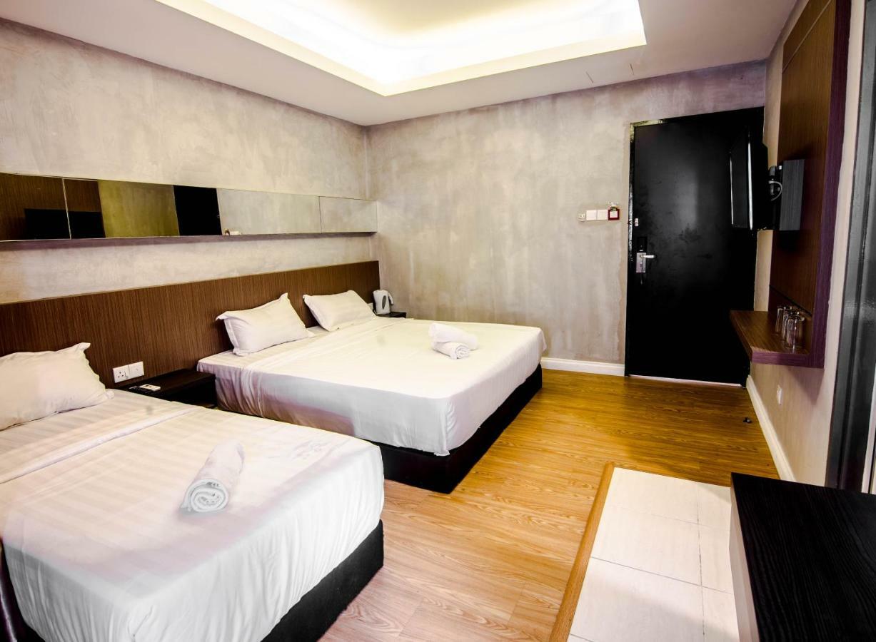 Monaco Boutique Hotel Sadong Jaya Kota Kinabalu Bagian luar foto
